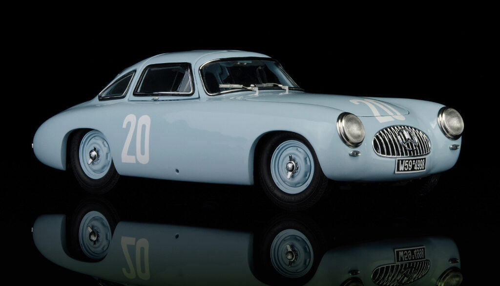 CMC M-159 — Mercedes-Benz 300 SL (W194) 1952, Hermann Lang #20, GP of Bern, front three-quarter view, left side, alternate angle 3, 1:18 scale diecast model