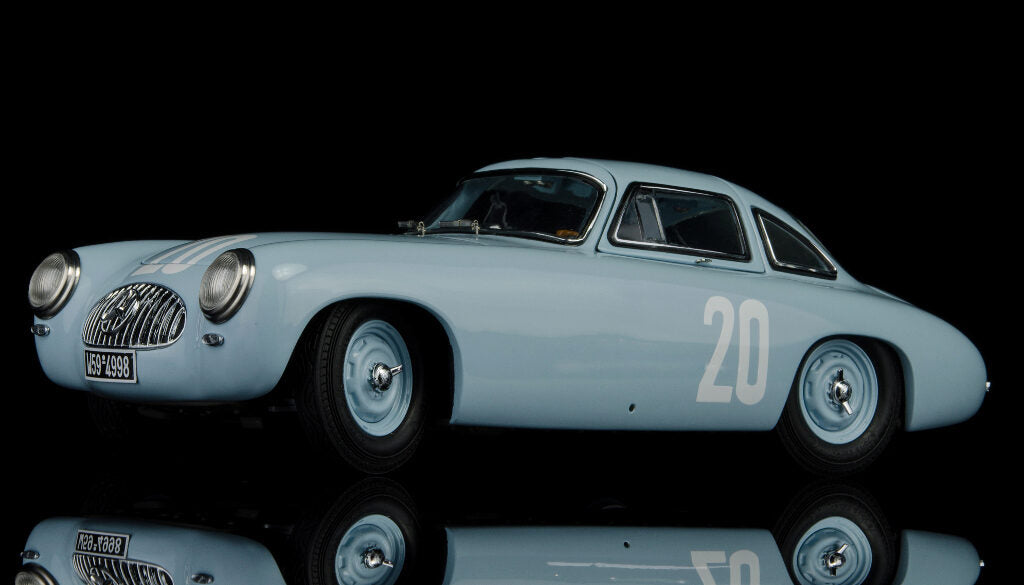 CMC M-159 — Mercedes-Benz 300 SL (W194) 1952, Hermann Lang #20, GP of Bern, front three-quarter view, alternate angle 2, 1:18 scale diecast model
