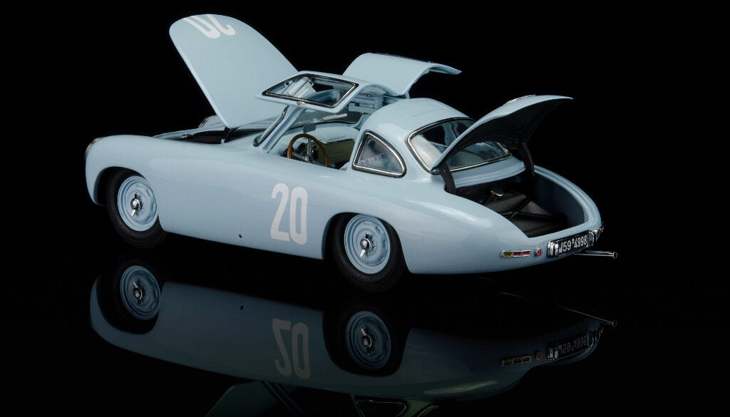 CMC M-159 — Mercedes-Benz 300 SL (W194) 1952, Hermann Lang #20, GP of Bern, rear three-quarter view, left side, 1:18 scale diecast model