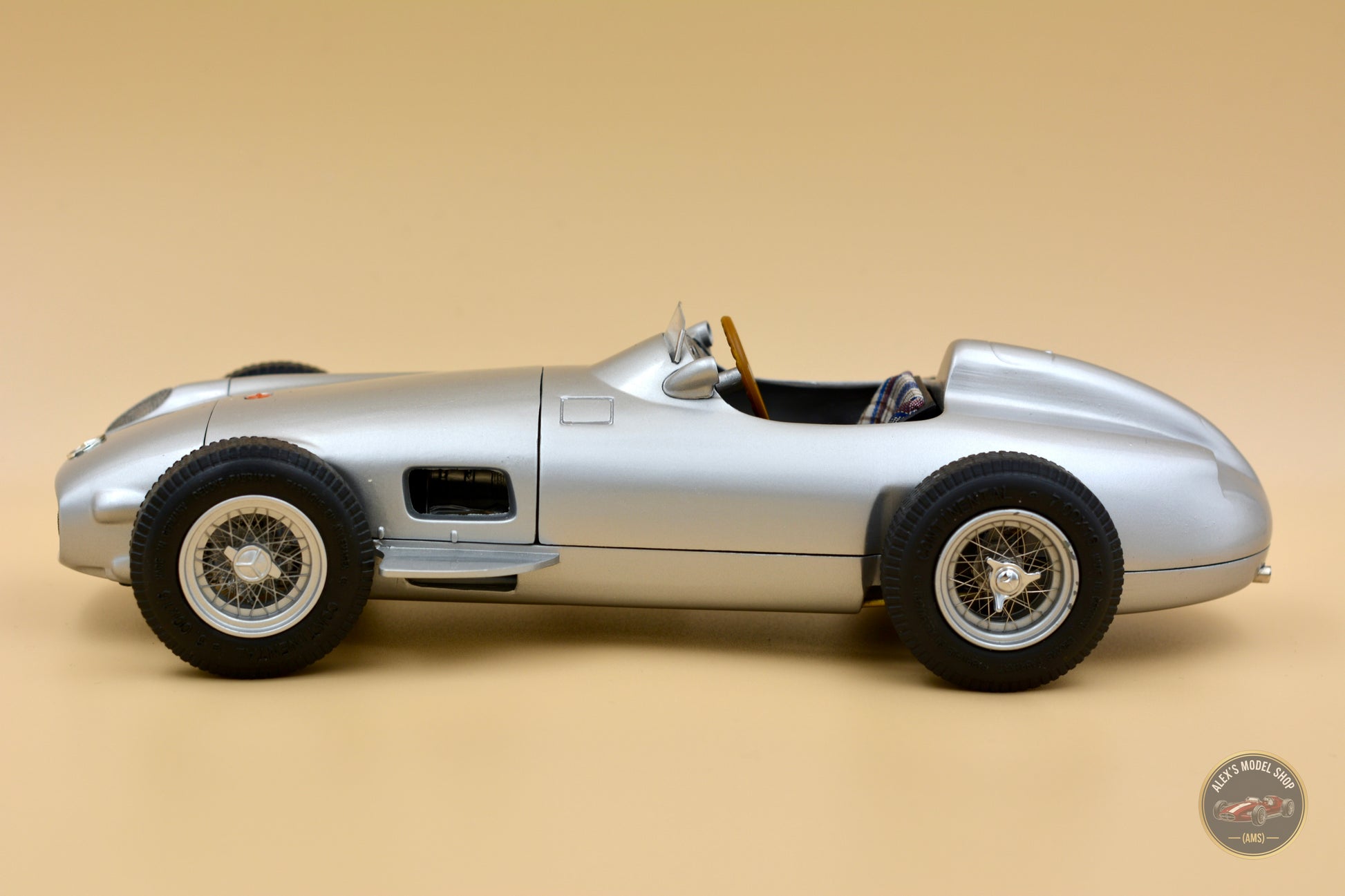 CMC M-006 — Mercedes-Benz W196 Monoposto 1954, left side profile, 1:18 scale diecast model