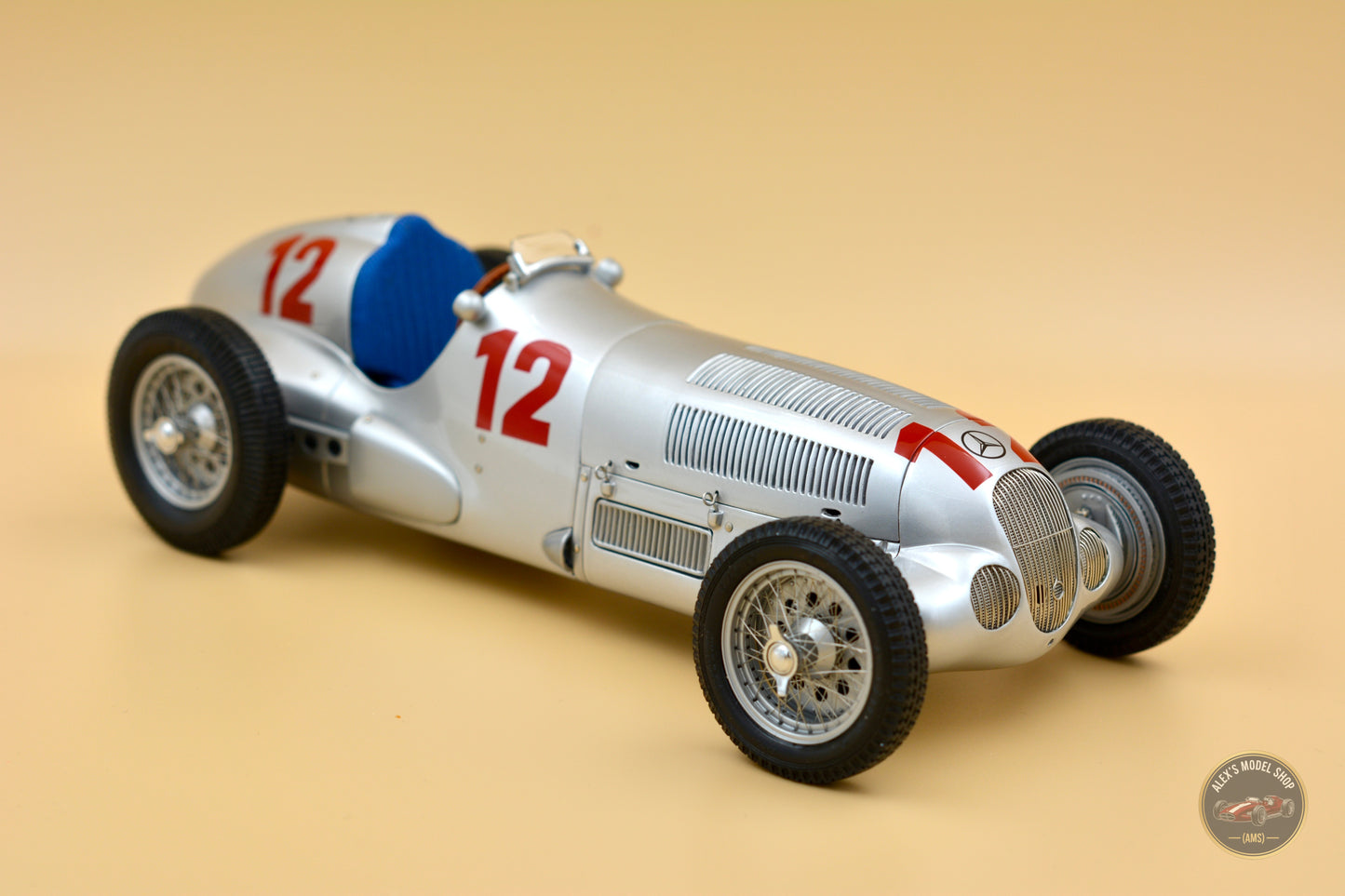 CMC 1:18 Mercedes-Benz W125 #12, Rudolf Caracciola (1937) — front three-quarter hero view