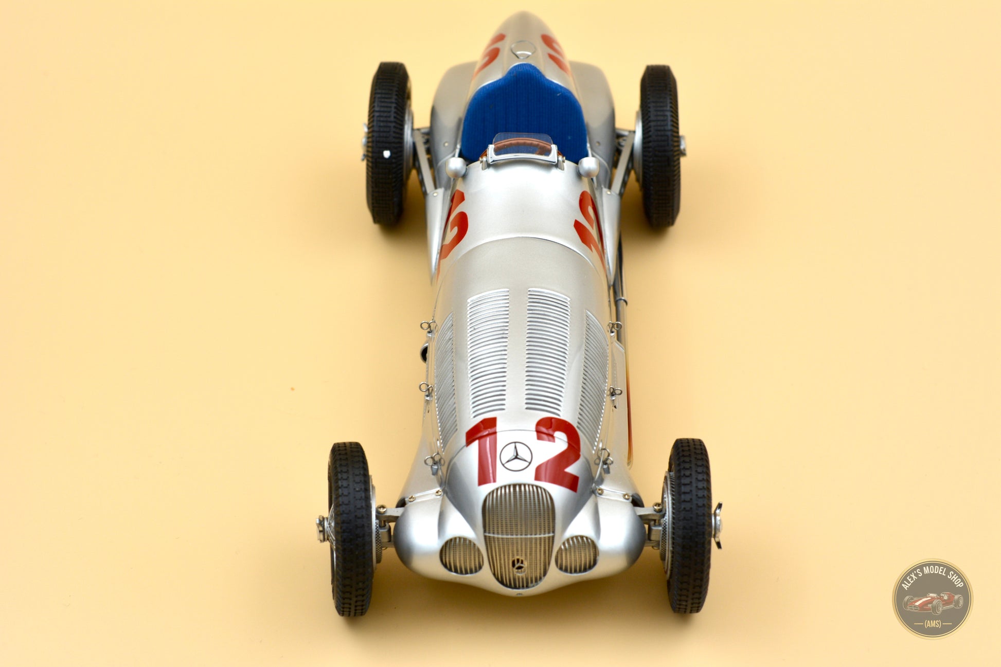 CMC 1:18 Mercedes-Benz W125 #12, Rudolf Caracciola (1937) — head-on front view, grille and race number