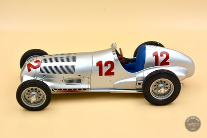 CMC 1:18 Mercedes-Benz W125 #12, Rudolf Caracciola (1937) — right side profile with exhaust pipes
