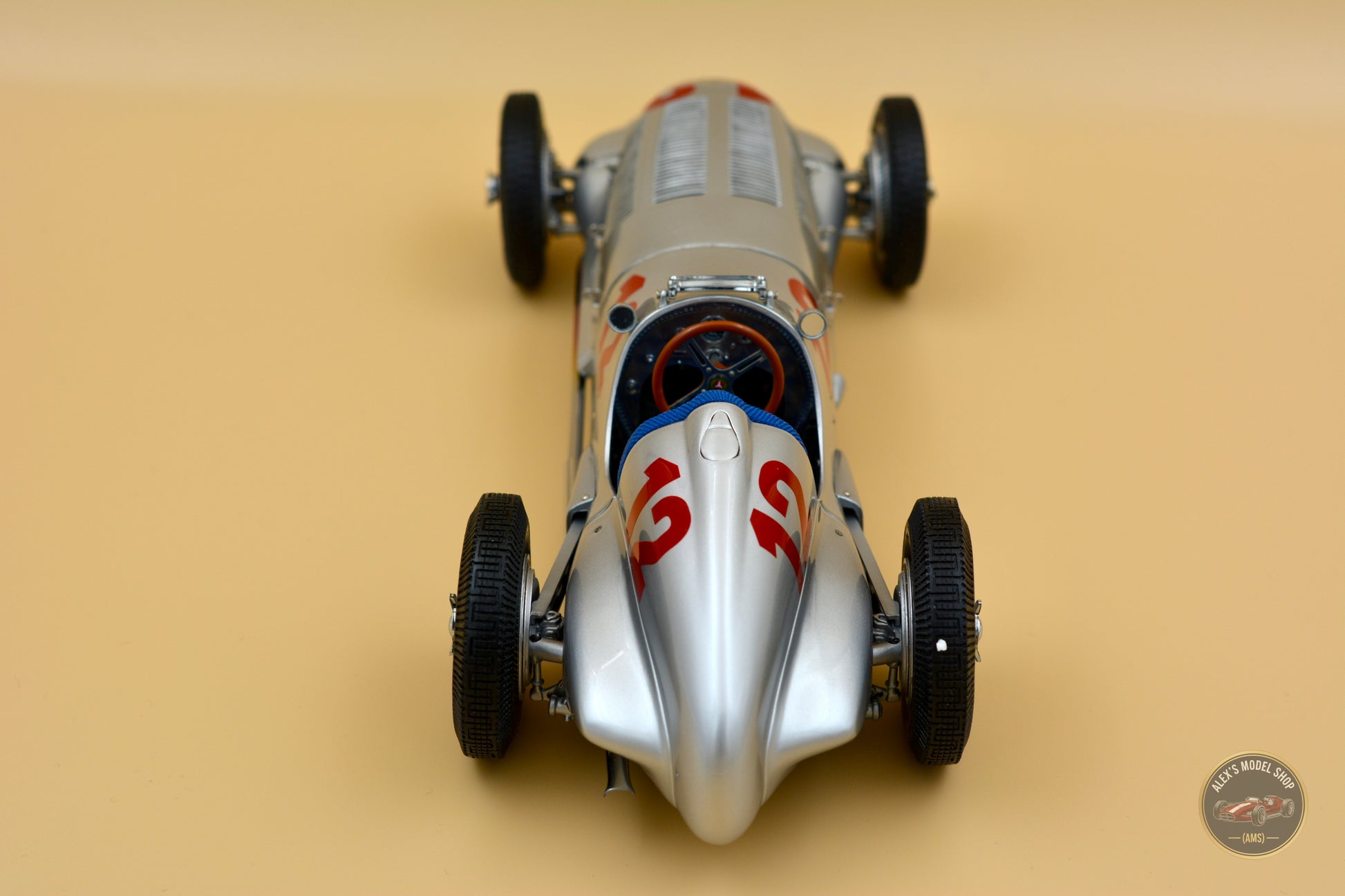 CMC 1:18 Mercedes-Benz W125 #12, Rudolf Caracciola (1937) — straight rear view, tail and exhaust outlet