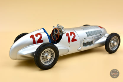 CMC 1:18 Mercedes-Benz W125 #12, Rudolf Caracciola (1937) — rear left three-quarter view